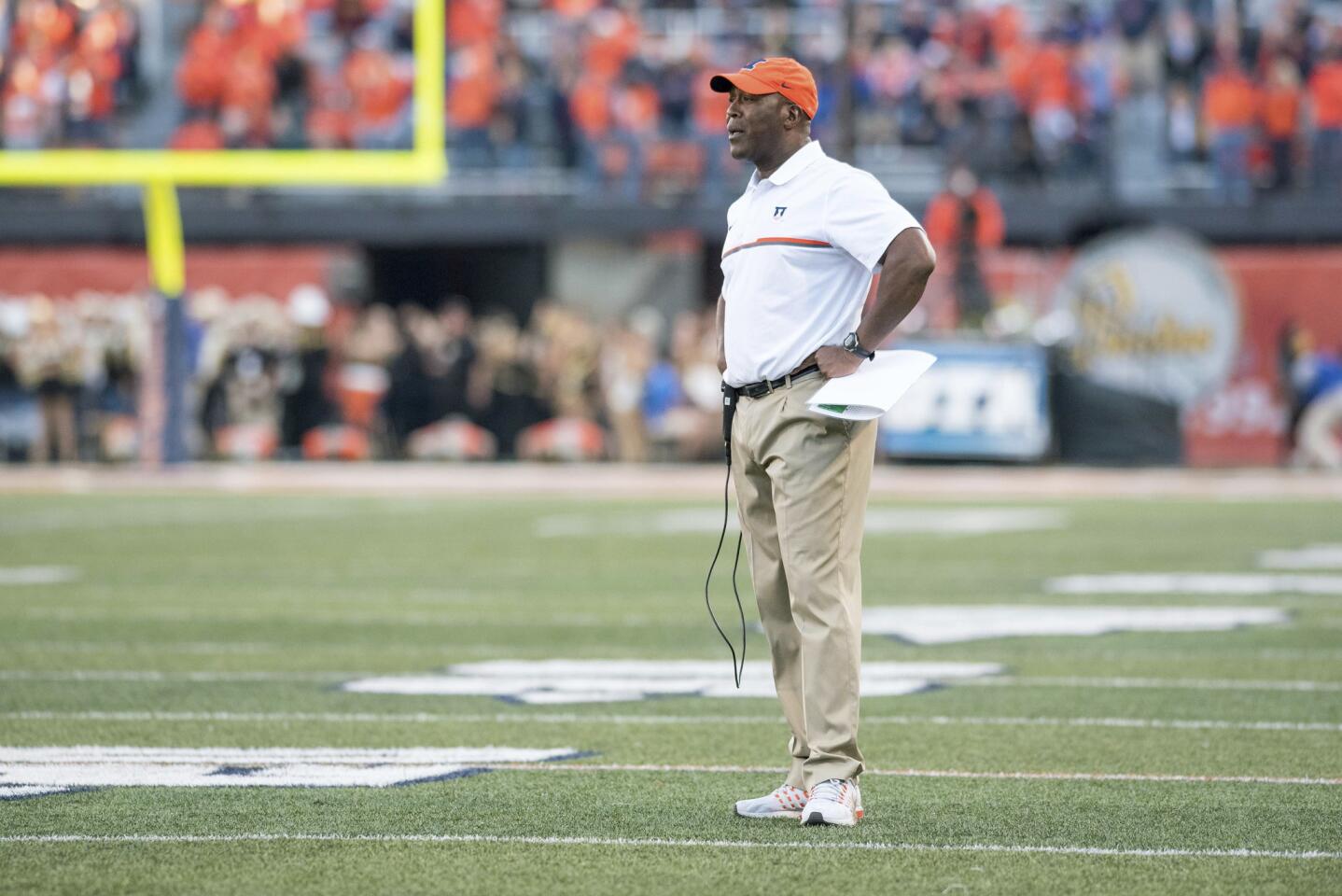 Lovie Smith stands on the field during a timeout during the second half against Purdue on Oct. 8, 2016. Purdue defeated Illinois 34-31 in overtime.