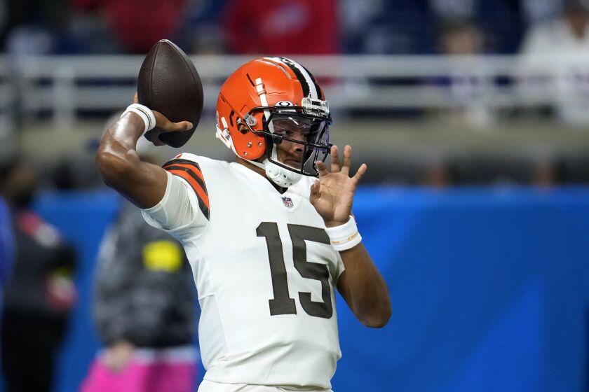 FILE - Cleveland Browns quarterback Joshua Dobbs throws during pregame of an NFL football game against the Buffalo Bills, Sunday, Nov. 20, 2022, in Detroit. Free agent quarterback Dobbs has agreed to re-sign with the Browns to back up starter Deshaun Watson, a person familiar with the negotiations told The Associated Press on Monday, March 20, 2023. (AP Photo/Paul Sancya, File)