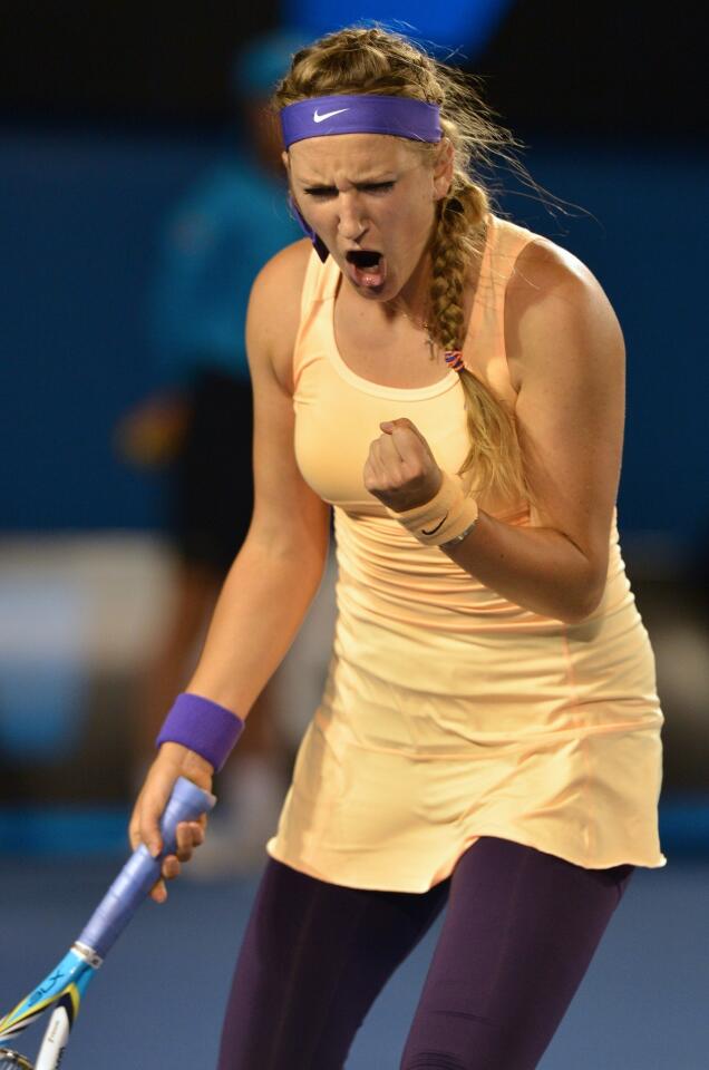 Top-seeded and top-ranked Victoria Azarenka reacts to winning a point against Li Na.