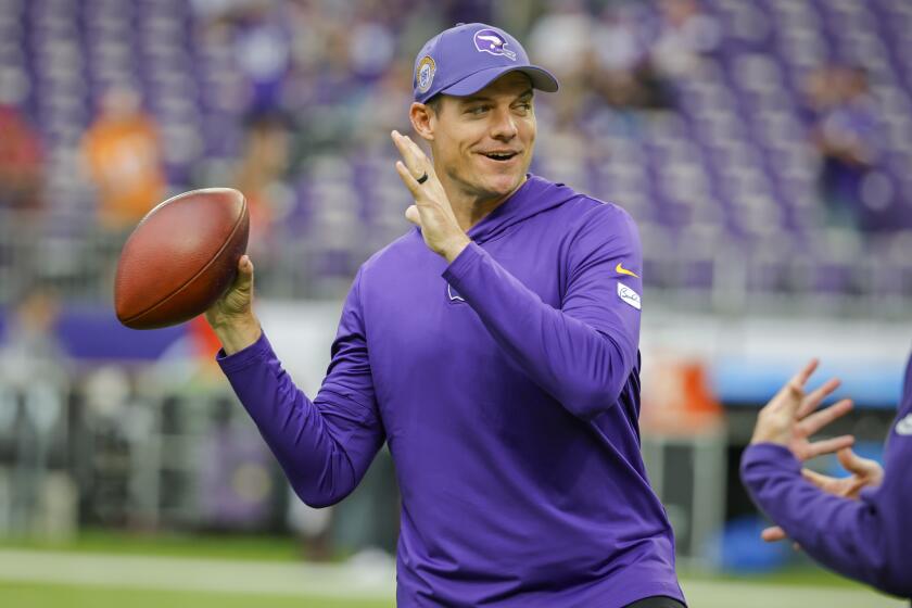 Minnesota Vikings head coach Kevin O'Connell plays catch on the field before an NFL football game against the Tampa Bay Buccaneers, Sunday, Sept. 10, 2023, in Minneapolis. (AP Photo/Bruce Kluckhohn)