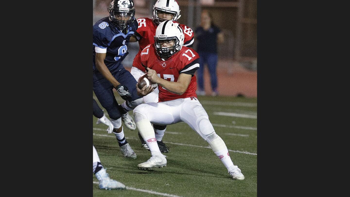 Photo Gallery: Crescenta Valley vs. Glendale in Pacific League football and the Crescenta Valley marching band takes the field in Halloween costumes