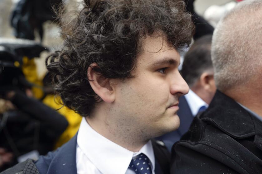 FTX founder Sam Bankman-Fried leaves Manhattan federal court, Tuesday, Jan. 3, 2023, in New York, after he pleaded not guilty to charges that he cheated investors and looted customer deposits on his cryptocurrency trading platform. (AP Photo/Seth Wenig)
