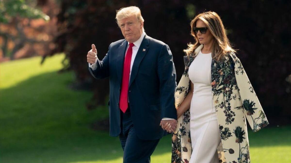 President Trump and First Lady Melania Trump leave the White House April 18 en route to his estate in Palm Beach, Fla.