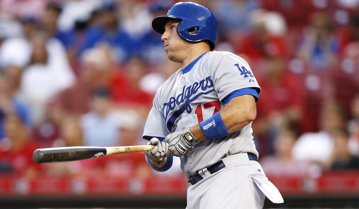 Dodgers' A.J. Ellis hits a two-run home run in the fourth inning against the Cincinnati Reds on Wednesday.