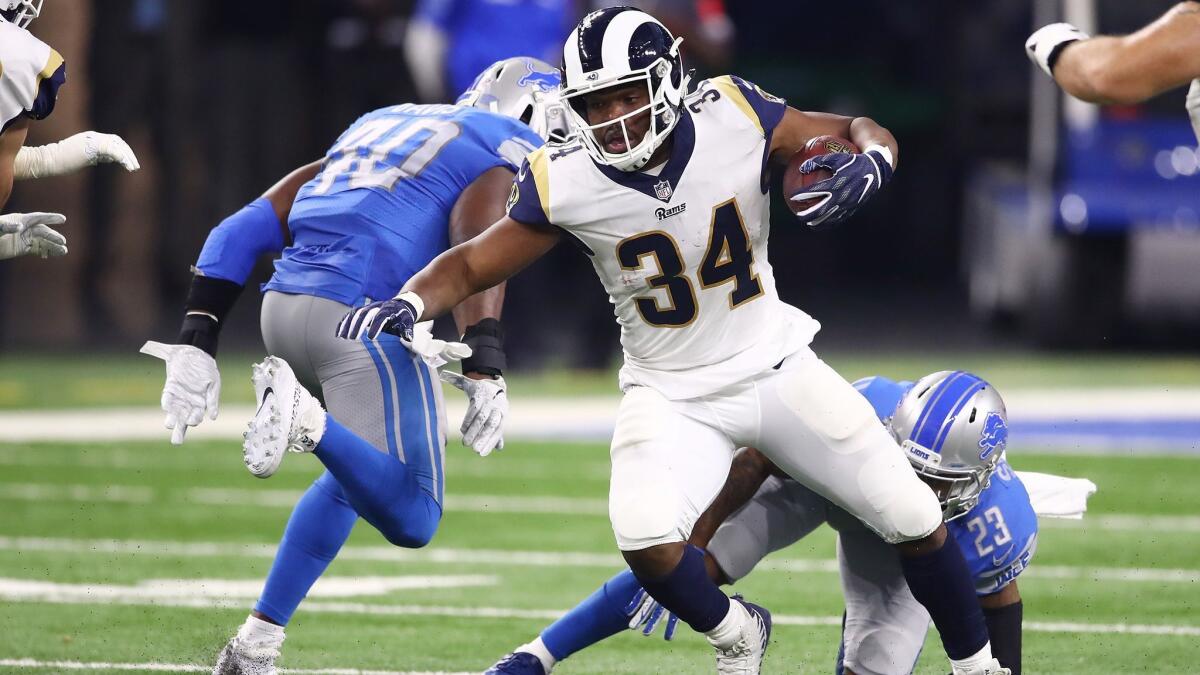 Rams running back Malcolm Brown looks for yardage against Detroit on Dec. 2.
