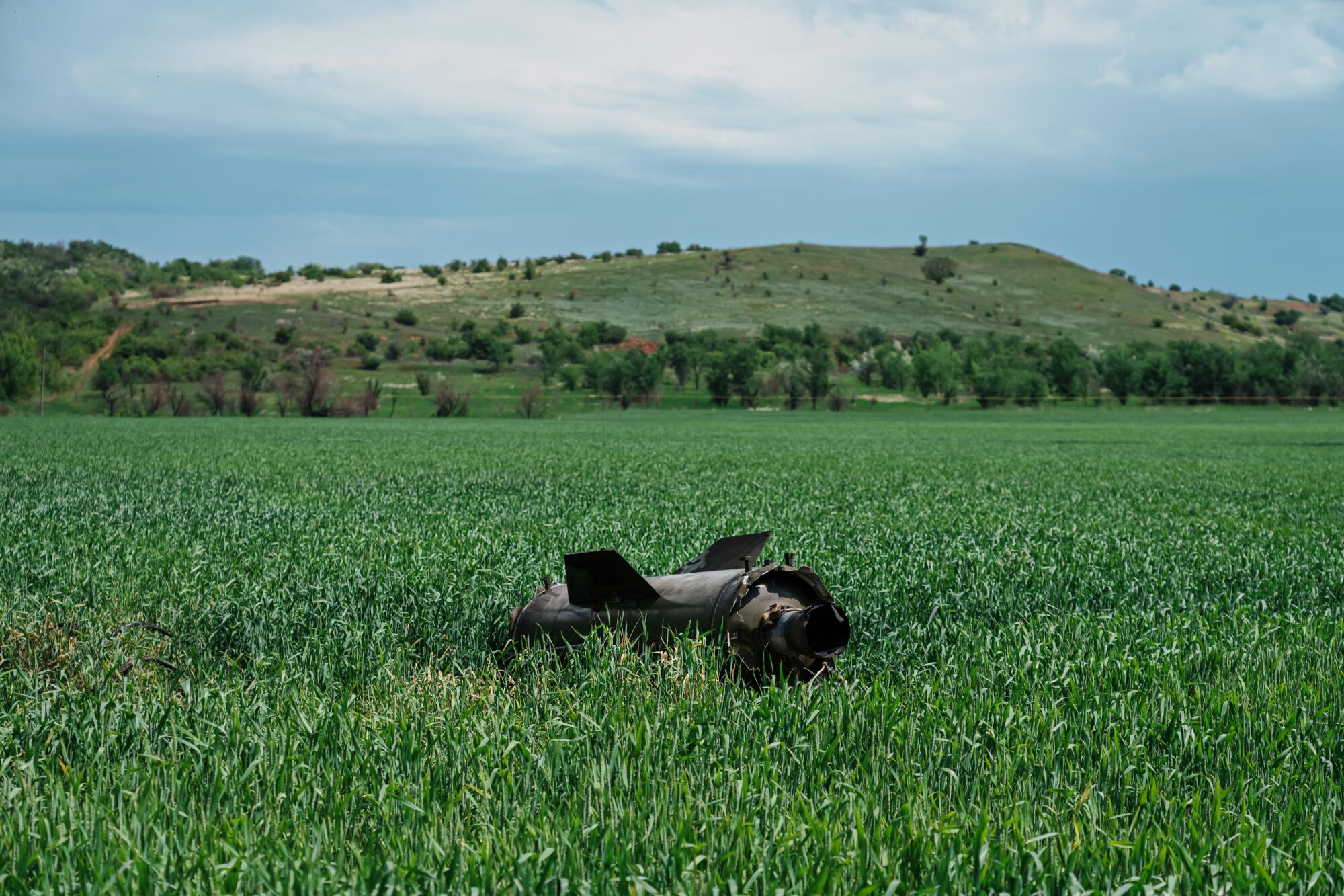 A burned out component of a rocket lies in the field outside Soledar, Ukraine.