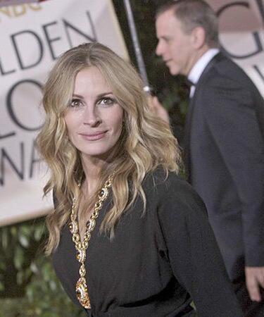 Julia Roberts greeted Billy Bush from NBC with, "NBC, you guys are in the toilet, right?" and Tom Hanks added, "NBC said it was going to rain at 10 p.m. but they moved it to 11:30." Snerk. We aren't sure we can add a better joke on top of that. -- Andrea Reiher, Zap2It