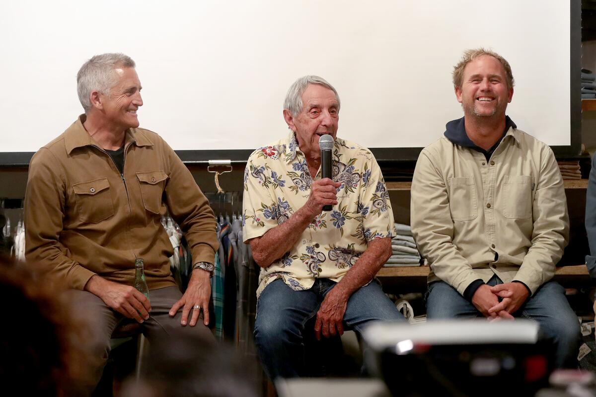Surfing pioneer Dick Metz, center, answers questions after the film screening.