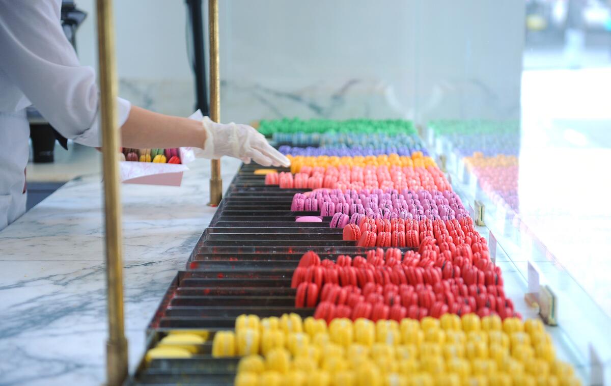 Macarons are displayed at the Bottega Louie restaurant, across the street (and above ground) from its pastry kitchen, in downtown Los Angeles.
