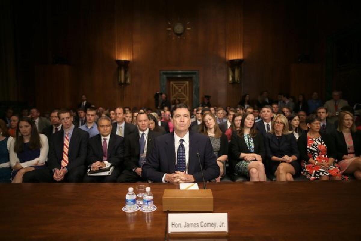James Comey Jr., nominee to be director of the FBI, prepares for his Senate Judiciary Committee confirmation hearing on Capitol Hill in Washington.