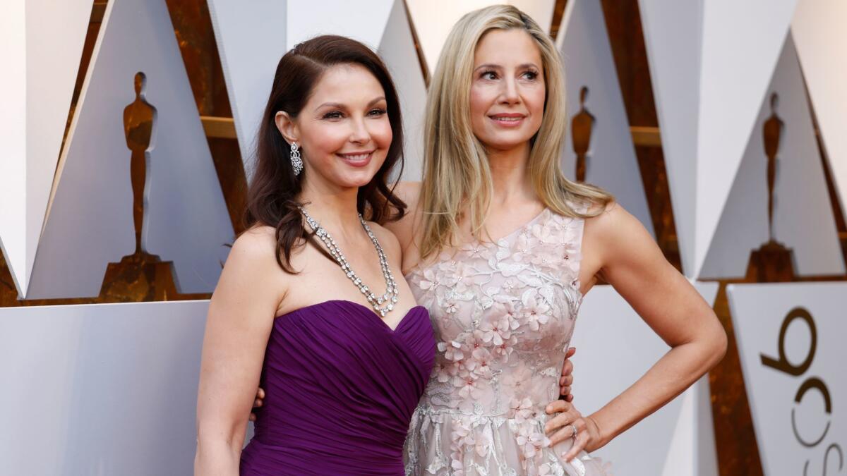 Ashley Judd, left, and Mira Sorvino on the Oscars red carpet.