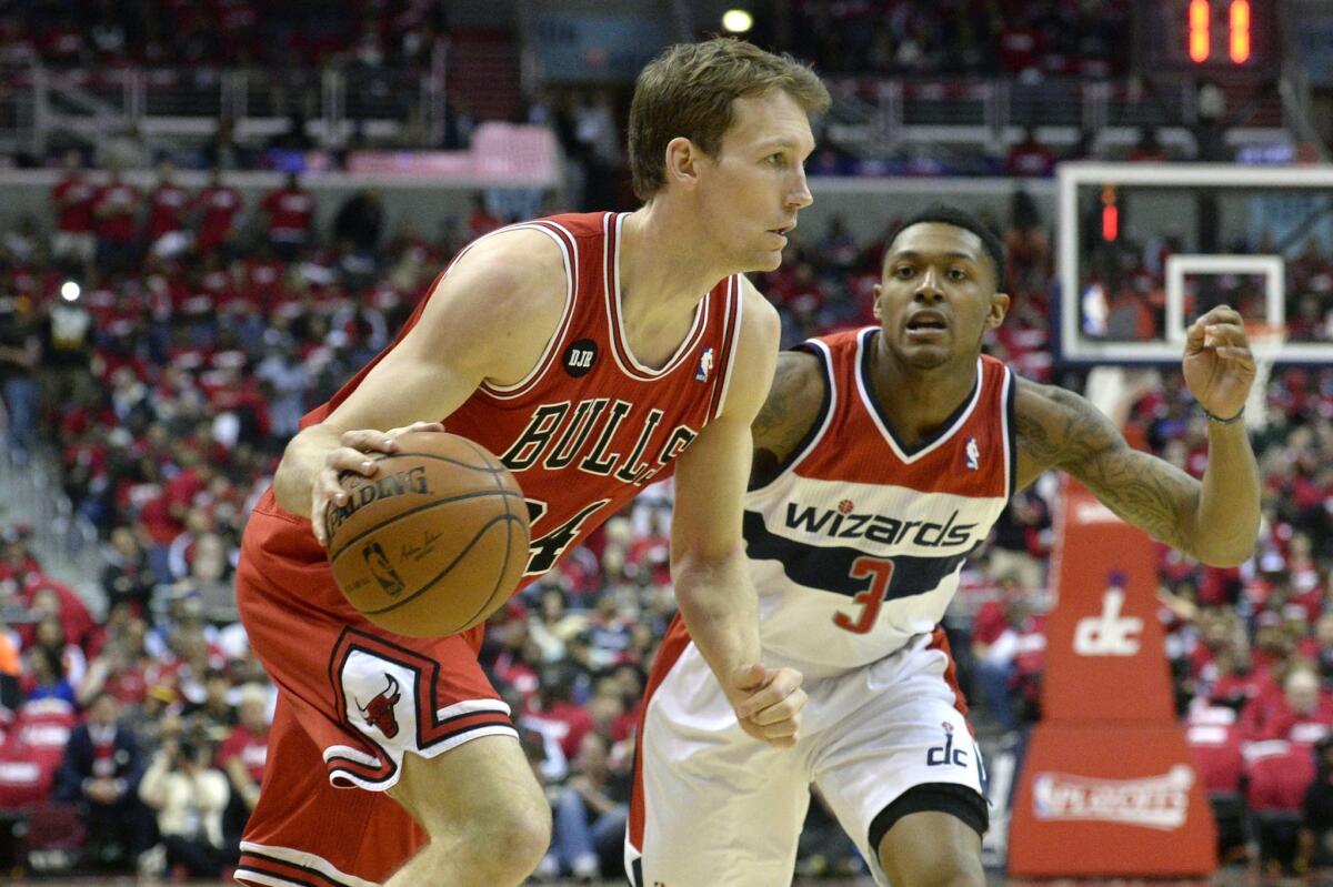 Chicago forward Mike Dunleavy had 35 points in the Bulls' 100-97 win Friday over the Washington Wizards at the United Center in Chicago.