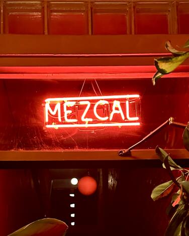 'Mezcal' sign in the entryway of Mírate