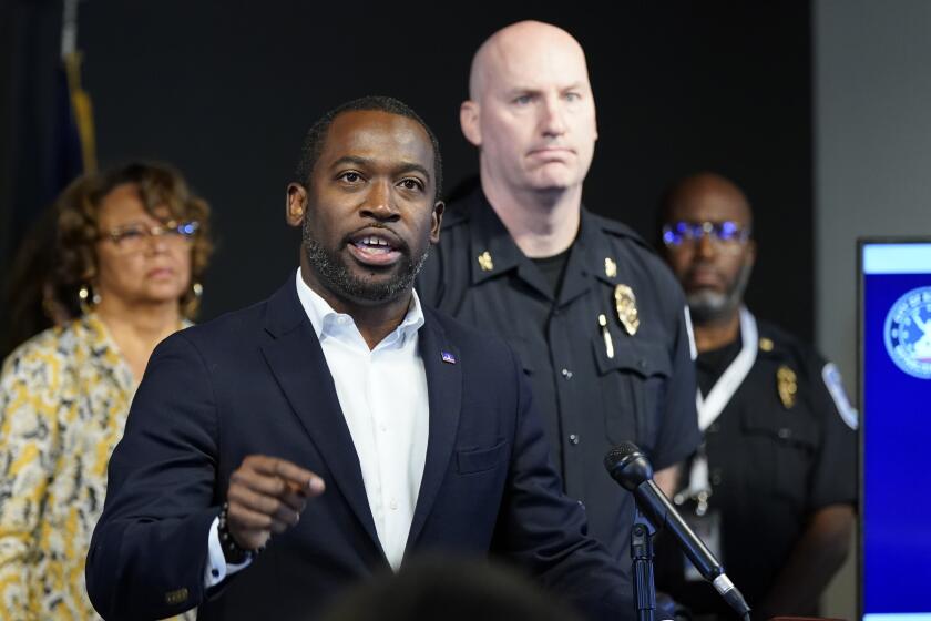 FILE - Richmond Mayor Levar Stoney, left, gestures as Richmond interim Police Chief Rick Edwards listens during a news conference in Richmond, Va, Wednesday, June 7, 2023. Democratic Richmond Mayor Levar Stoney announced Tuesday, April 23, 2024, that he is dropping his bid for Virginia governor in 2025 and will instead run for lieutenant governor. (AP Photo/Steve Helber, File)