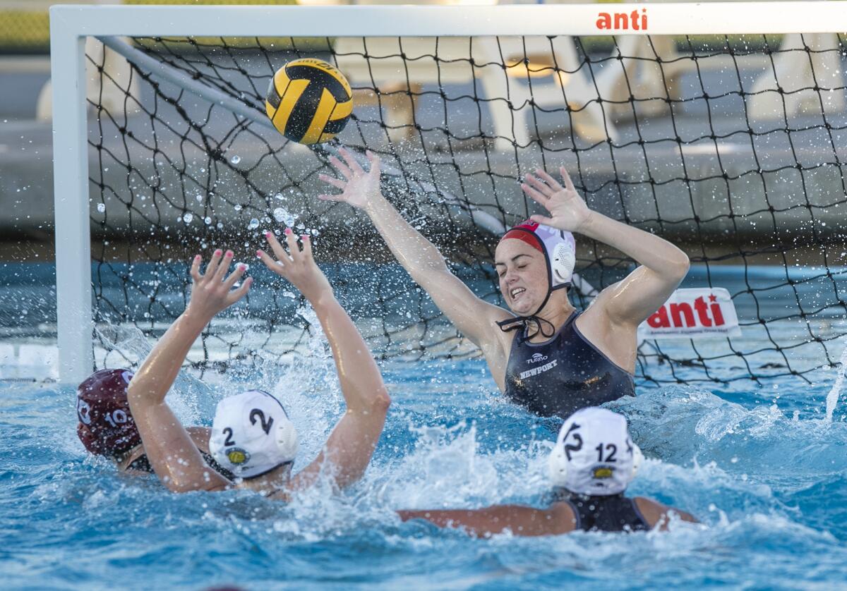 Newport Harbor goalkeeper Anna Reed reaches for a save during a match against Laguna Beach on Jan. 24.