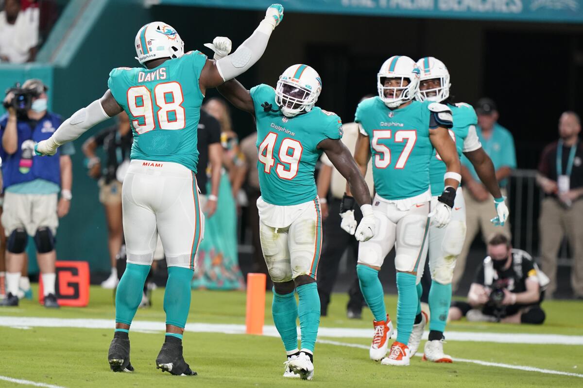 Dolphins place DT Raekwon Davis on IR with knee injury - The San