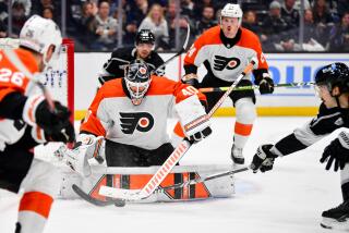 LOS ANGELES, CA - NOVEMBER 11: Cal Petersen #40 of the Philadelphia Flyers protects the goal.