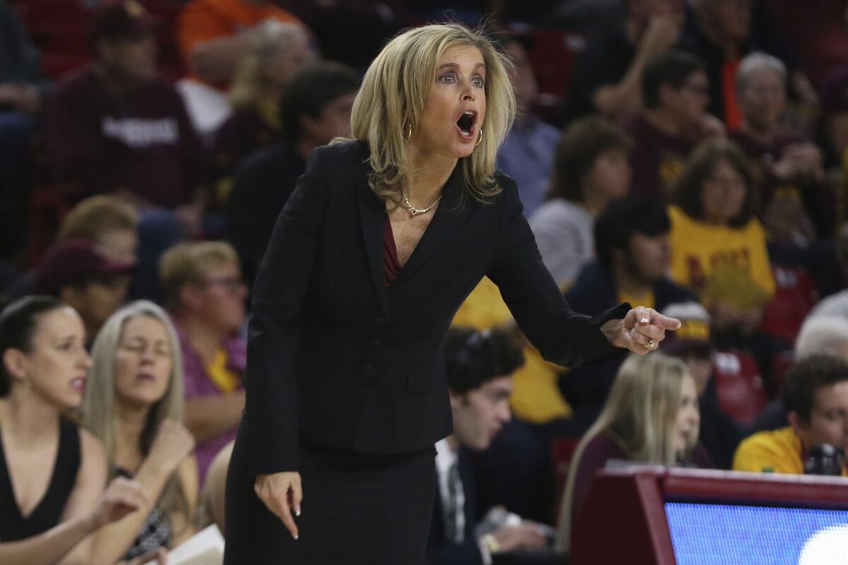 Arizona State head coach Charlie Turner Thorne shouts instructions to her team as they play Oregon State during the first half on Sunday in Tempe, Ariz.