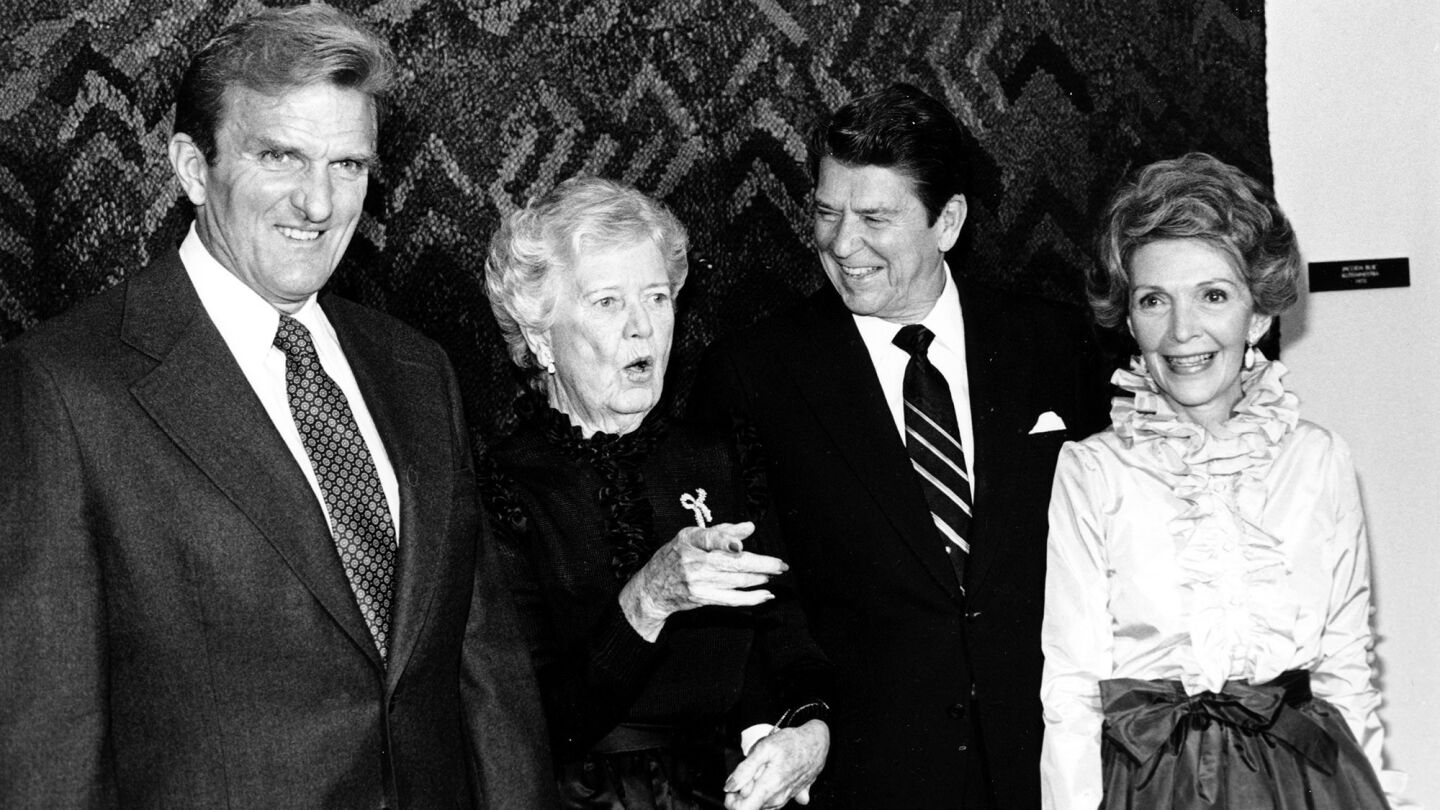 The Reagans attend a 1980 reception in their honor in Los Angeles with Los Angeles Times Publisher Otis Chandler and his mother, Dorothy.