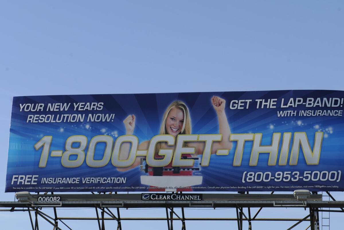 A billboard in 2011 advertises weight-loss surgery.