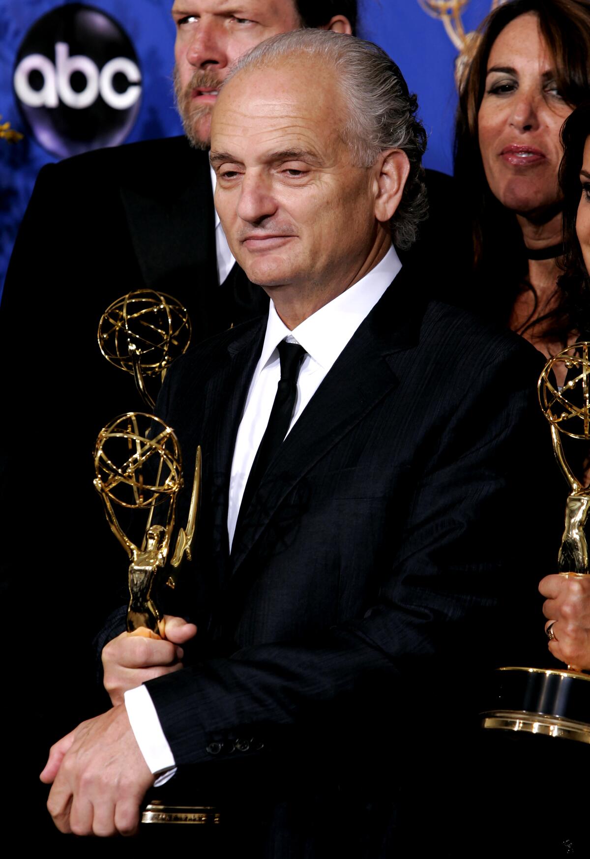 "The Sopranos" executive producer David Chase holds his Emmy Award.