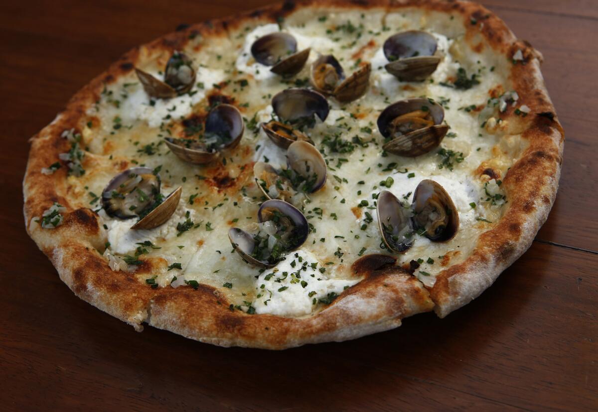 The clam, whipped ricotta, garlic confit and olive oil pizza, as served at Spartina restaurant in Los Angeles.