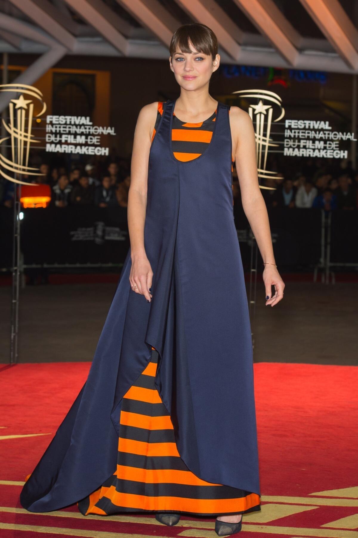 Marion Cotillard wears Dior Haute Couture at the "Waltz With Monica" premiere at the Marrakech International Film Festival in Marrakech, Morocco.