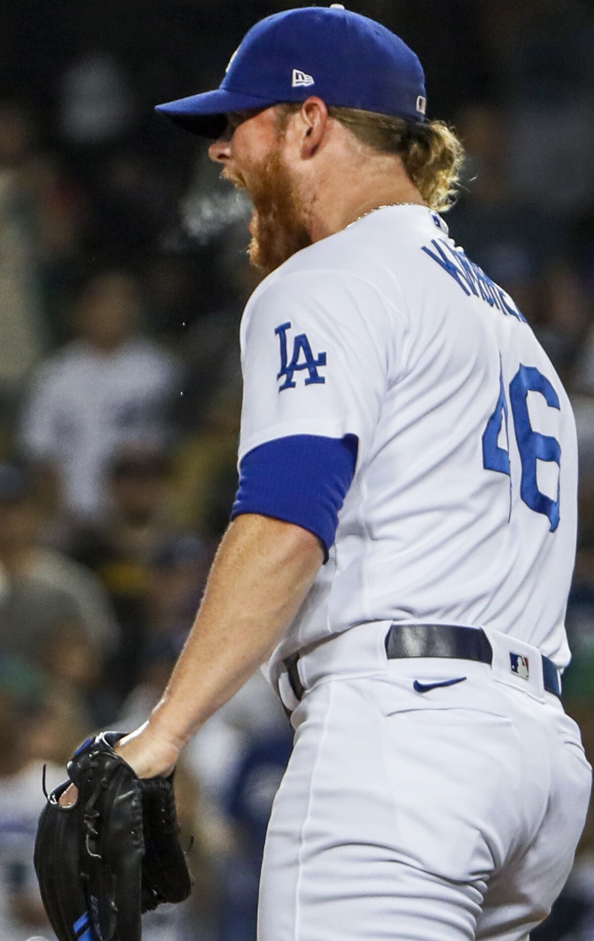 Dodgers closer Craig Kimbrel shouts after closing out a 3-1 victory over the San Diego Padres.