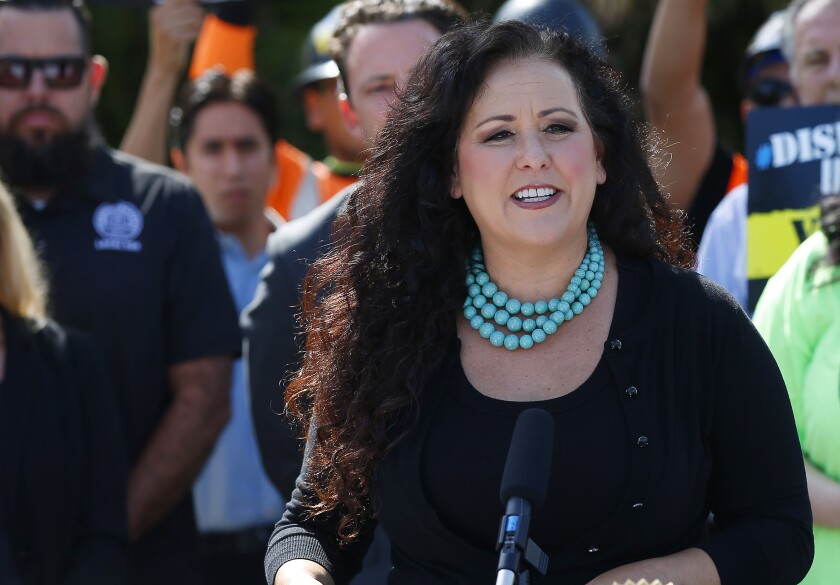 Assemblywoman Lorena Gonzalez speaks at a news conference in San Diego on Aug. 29, 2019 supporting Assembly Bill 5, which makes some independent contractors employees of the companies they work for under certain conditions.