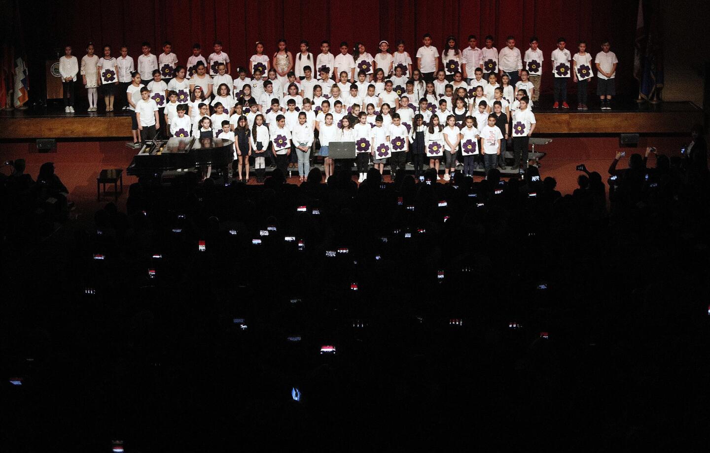 One-hundred-two elementary school students from R.D. White and Jefferson take the stage to perform "April Khagagh" and "Eye of the Tiger" in the 18th annual Armenian Genocide Commemoration in the John Wayne Performing Arts Center at Glendale High School on Wednesday, April 17, 2019. Performances by students at Glendale Unified School District schools performed, from elementary to high school.