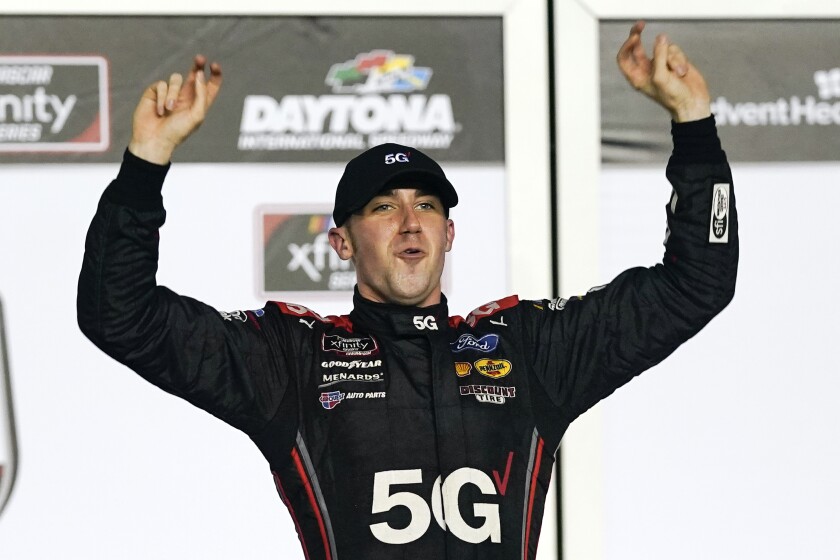 Austin Cindric celebrates after winning the NASCAR Xfinity Series race Saturday at Daytona International Speedway.