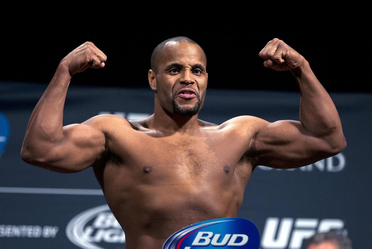 Daniel Cormier poses during a weigh-in on Jan. 2 before his fight against Jon Jones.