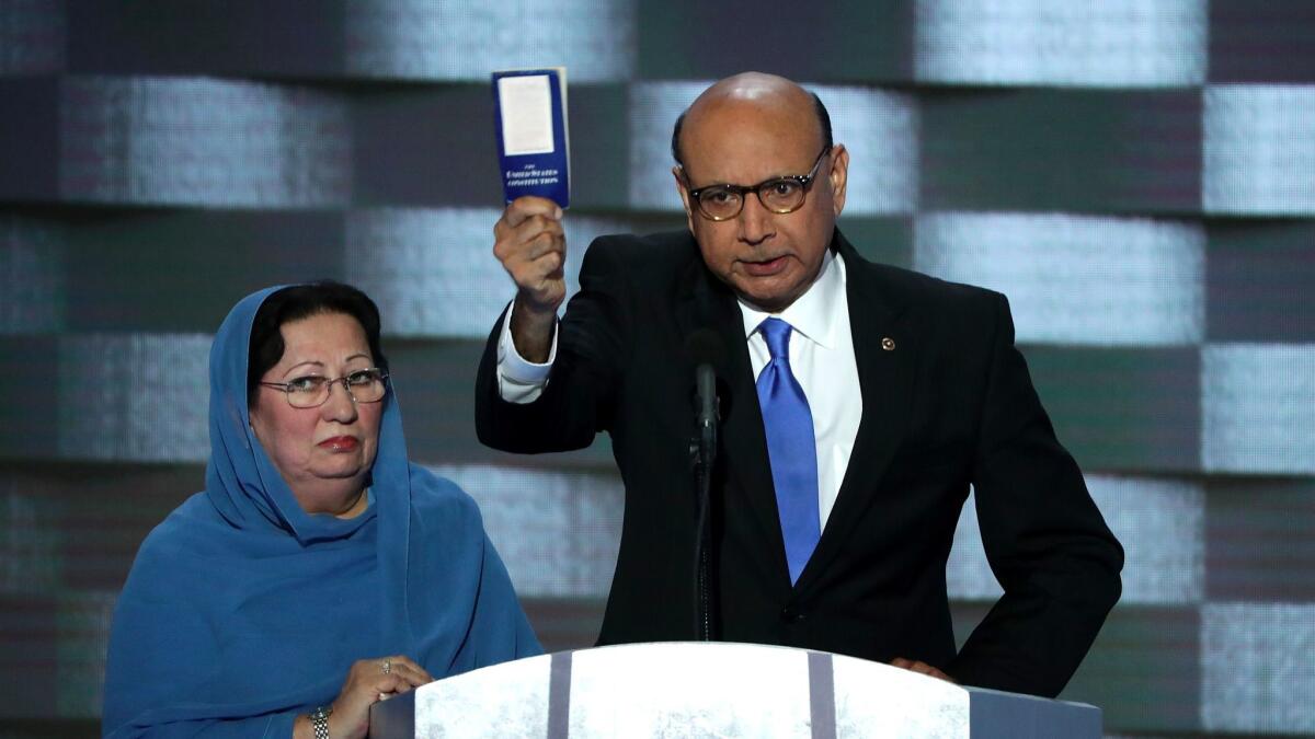 Khizr Khan holds a pocket U.S. Constitution at the Democratic National Convention in July.