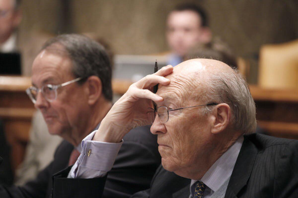 Commission on Fiscal Responsibility and Reform co¿chairmen Erskine Bowles, left, and Alan Simpson, listen to remarks as the last session of the commission was held on Capitol Hill in Washington in 2010.