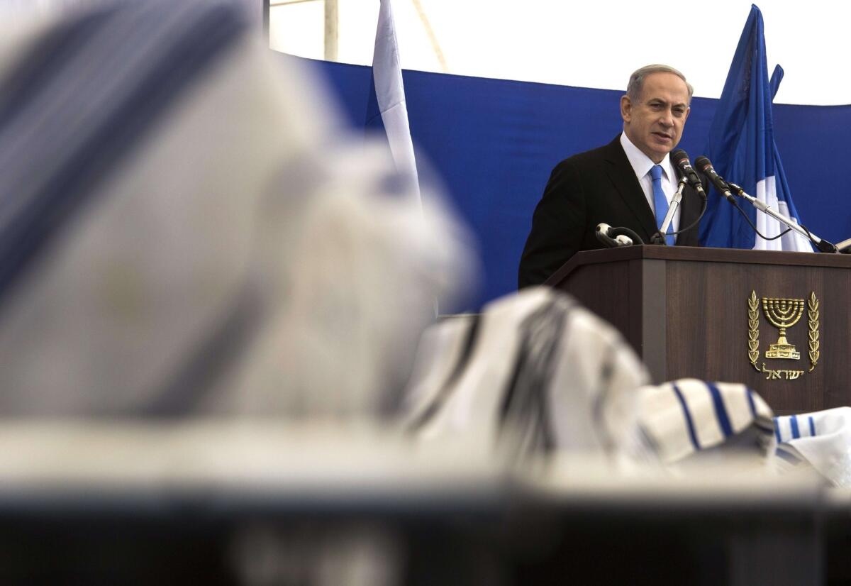 Israeli Prime Minister Benjamin Netanyahu speaks at Jan. 13 funeral ceremonies in Jerusalem for four Jews killed during an attack on a kosher supermarket in Paris last week.