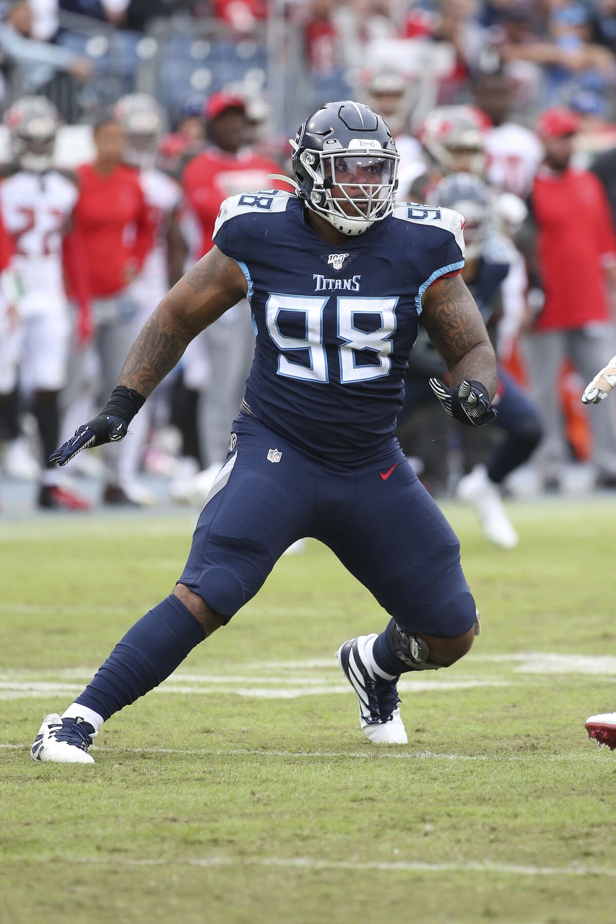 FILE - In this Oct.27, 2019, file photo, Tennessee Titans defensive tackle Jeffery Simmons (98) plays during an NFL football game against the Tampa Bay Buccaneers in Nashville, Tenn. Simmons, DaQuan Jones and Harold Landry are ready for the challenge of filling the hole left by Tennessee trading five-time Pro Bowl defensive lineman Jurrell Casey to Denver in March. (AP Photo/Michael Zito, File)