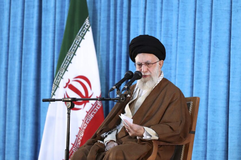 In this picture released by the official website of the office of the Iranian supreme leader, Supreme Leader Ayatollah Ali Khamenei speaks during a ceremony commemorating the death anniversary of the late revolutionary founder Ayatollah Khomeini at his mausoleum just outside Tehran, Iran, Sunday, June 4, 2023. (Office of the Iranian Supreme Leader via AP)