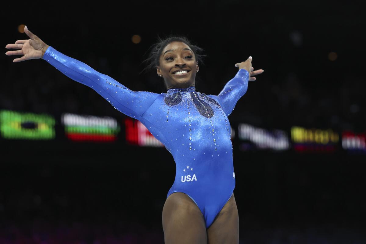 U.S. gymnast Simone Biles celebrates after winning gold in the women's all-around final.
