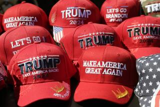 Vendors sell Trump merchandise before former President Donald Trump's rally Friday, Sept. 23, 2022, in Wilmington, N.C. (AP Photo/Chris Seward)