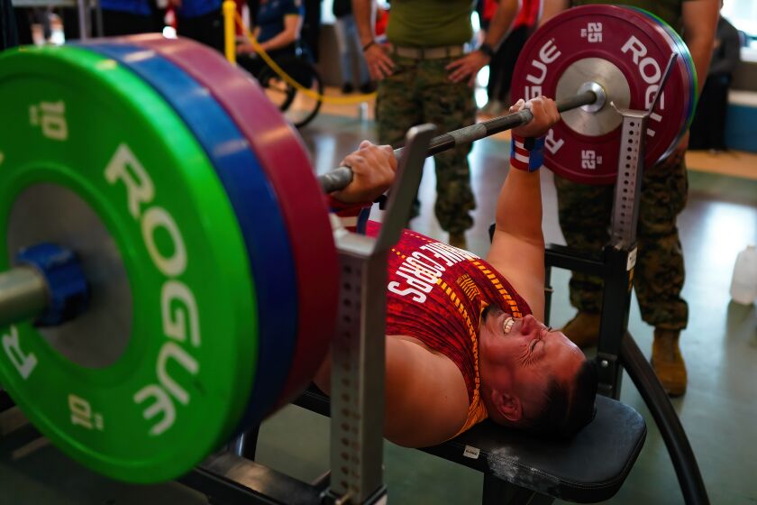 Oceanside, CA - March 04: At Camp Pendleton on Saturday, March 4, 2023 in Oceanside, CA., Staff Sgt. Raymond Cardoza (ret) successfully bench presses 287 lbs at the Marine Corps Trials. (Nelvin C. Cepeda / The San Diego Union-Tribune)