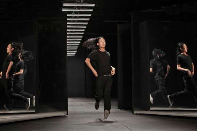 Fashion designer Alexander Wang takes a bow during New York Fashion Week.