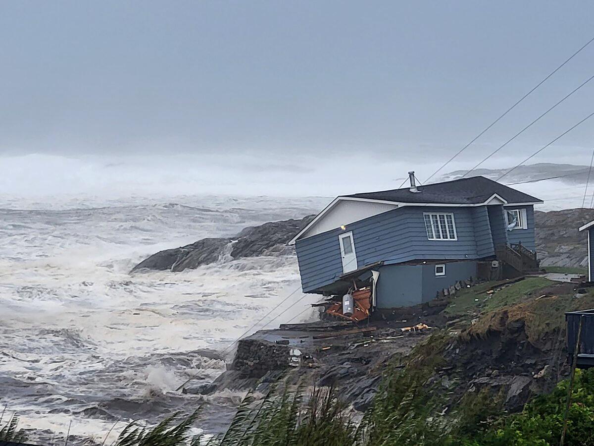 High winds batter a home in Port aux Basques, Newfoundland and Labrador.