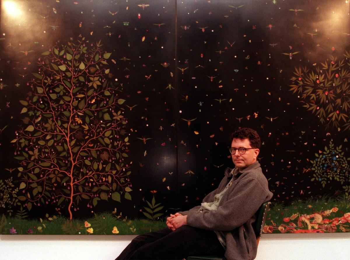 Artist Fred Tomaselli with his work at the Christopher Grimes Gallery in the late 1990s. Though he now lives in New York, the artist was part of the downtown scene in the early 1980s.