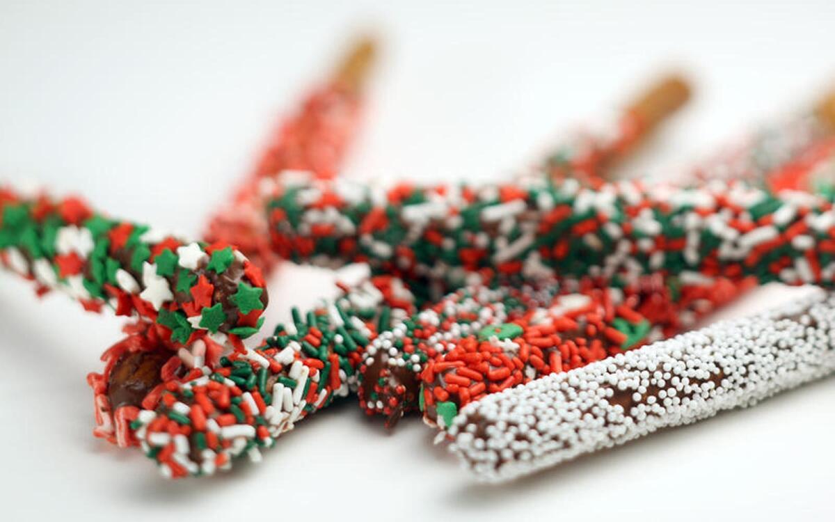 Mix and match the decorated pretzels for gift bags. Recipe: Snowflake pretzel rods