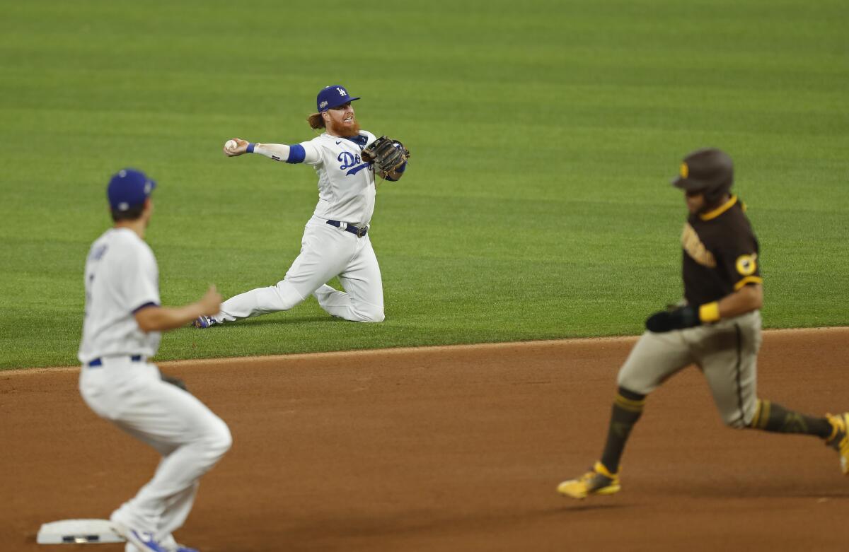 Dodgers third baseman Justin Turner makes a play on the right side of second base thanks to employing the shift.