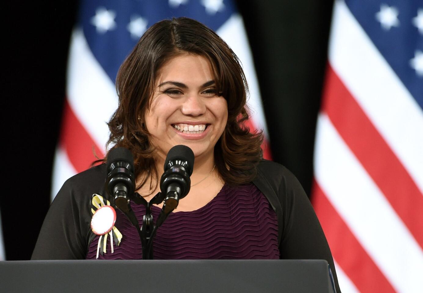 Immigration activist Astrid Silva introduces President Obama at Del Sol High School in Las Vegas.