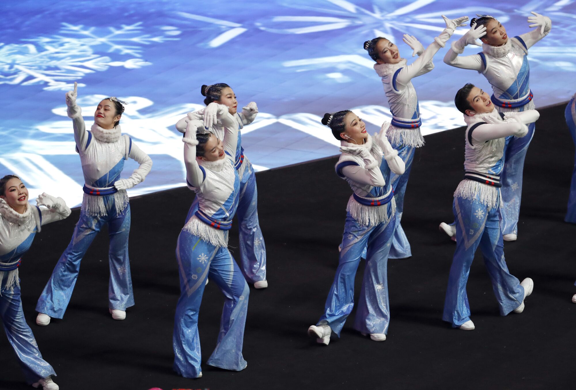 Dancers perform during the 2022 Beijing Olympics opening ceremony.