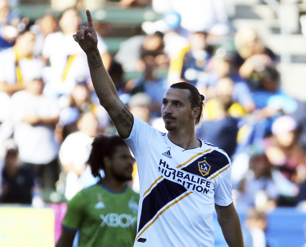 LA Galaxy forward Zlatan Ibrahimovic (9) celebrates his goal against the Seattle Sounders in the first half of an MLS soccer match in Carson, Calif., Sunday, Sept. 23, 2018. The Galaxy won 3-0.