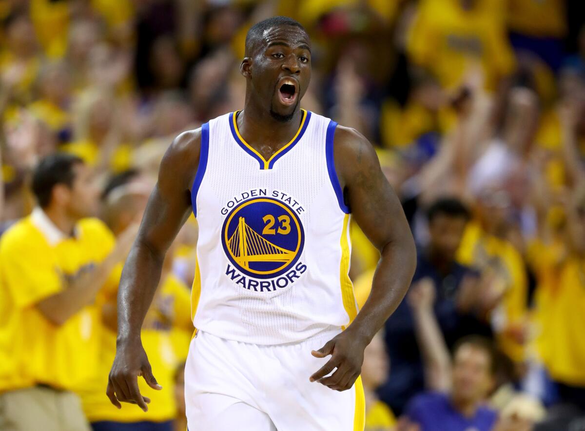 Draymond Green reacts after making a three-point shot on June 19.