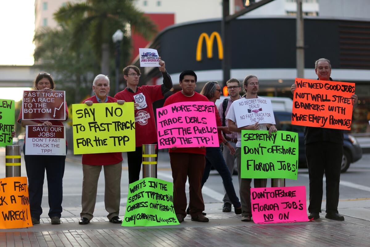 Protesters rally against the Trans-Pacific Partnership last month in Miami.
